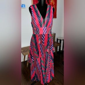 Beautiful multi tier deep v below knee dress.